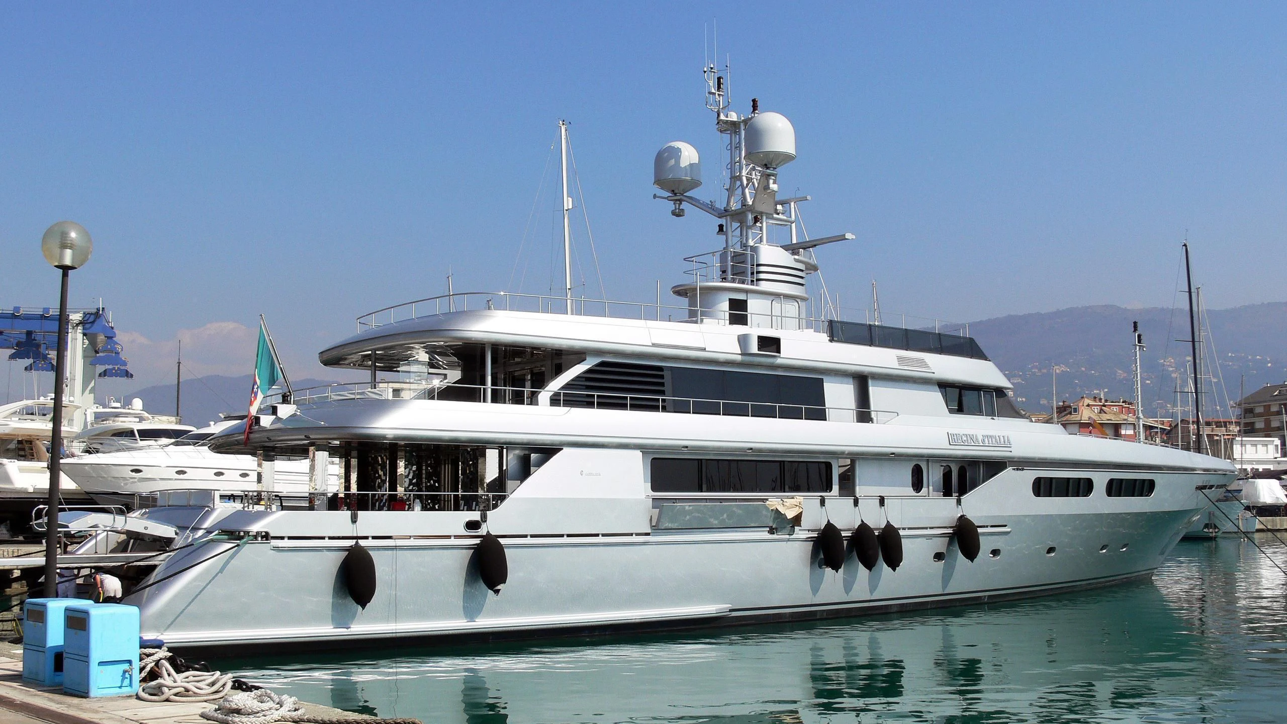 a white yacht docked aboard MY FAIR LADY Yacht for Sale