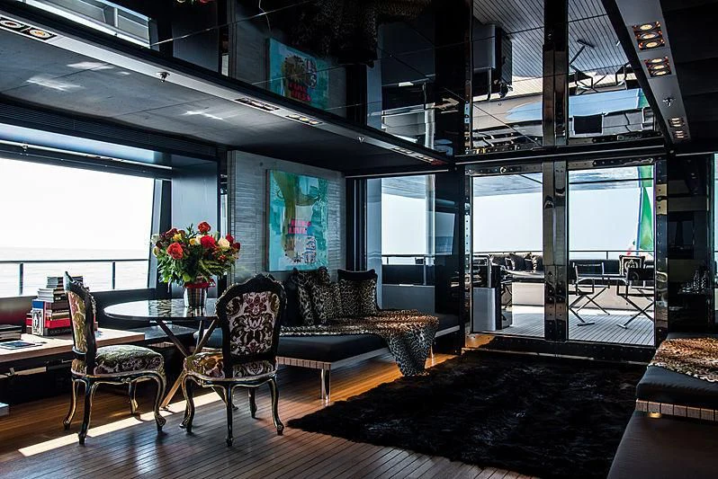 a living room with a large window aboard MY FAIR LADY Yacht for Sale