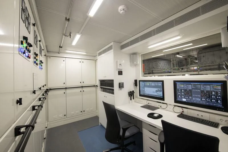 a room with computers and monitors aboard SEA EAGLE Yacht for Sale