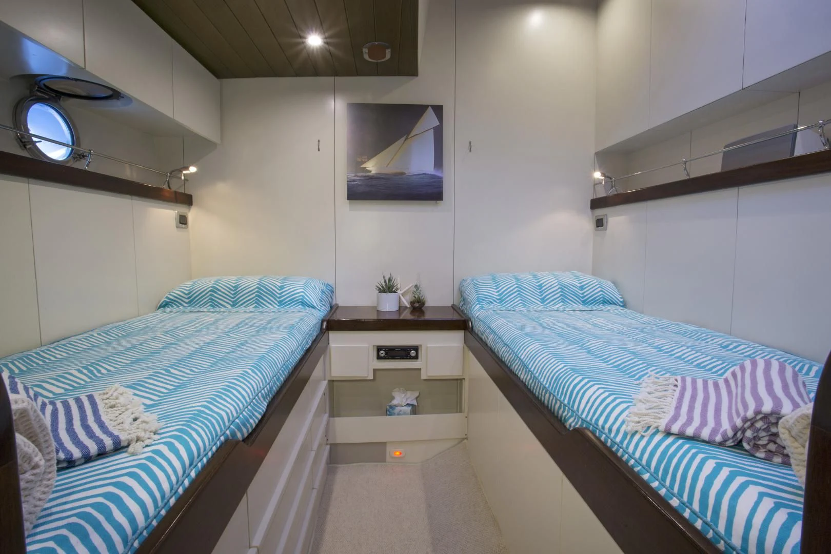 a room with two beds aboard WISDOM Yacht for Sale