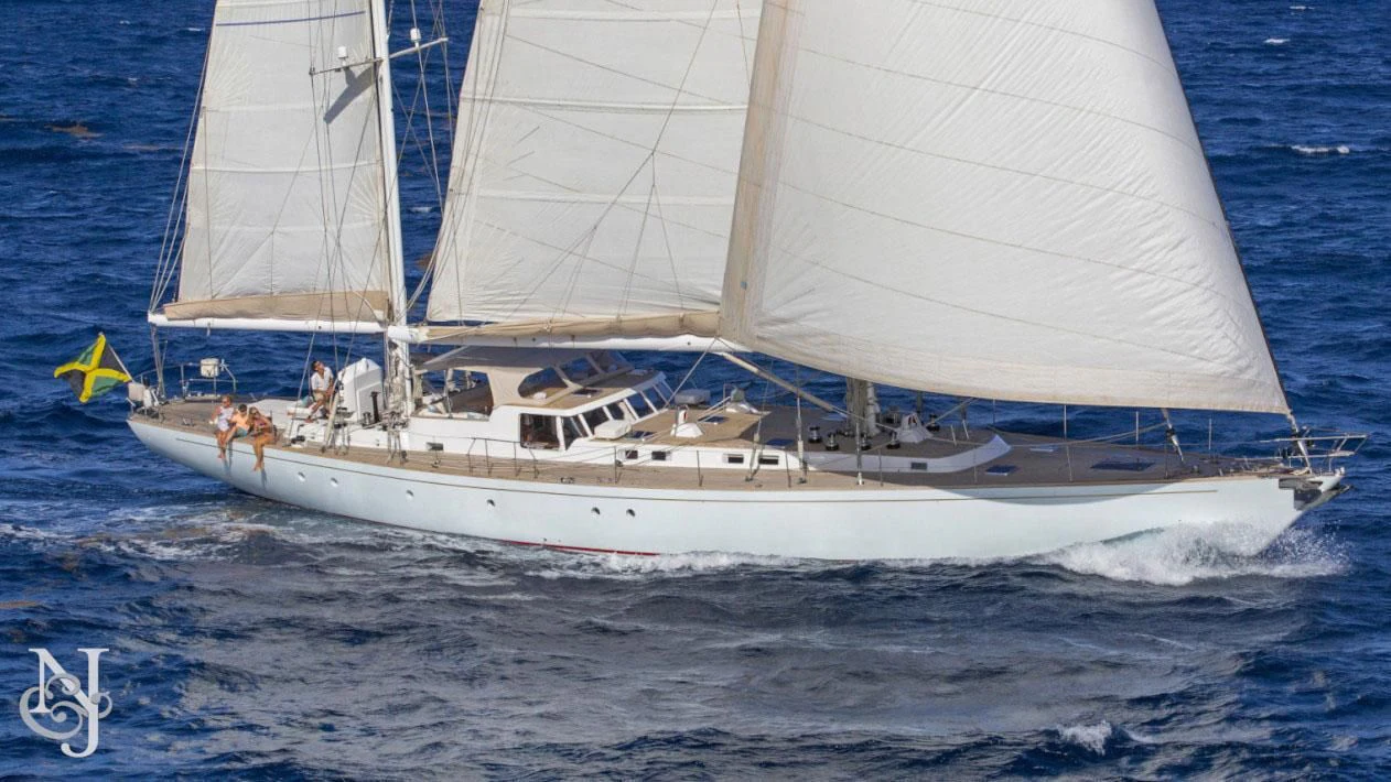 a white boat on the water aboard WISDOM Yacht for Sale