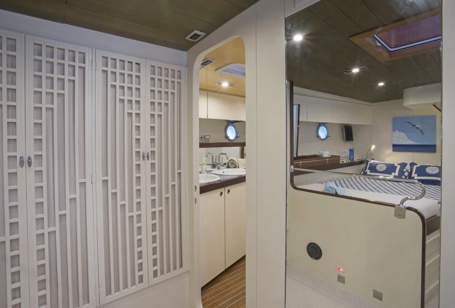 a bathroom with a large mirror aboard WISDOM Yacht for Sale