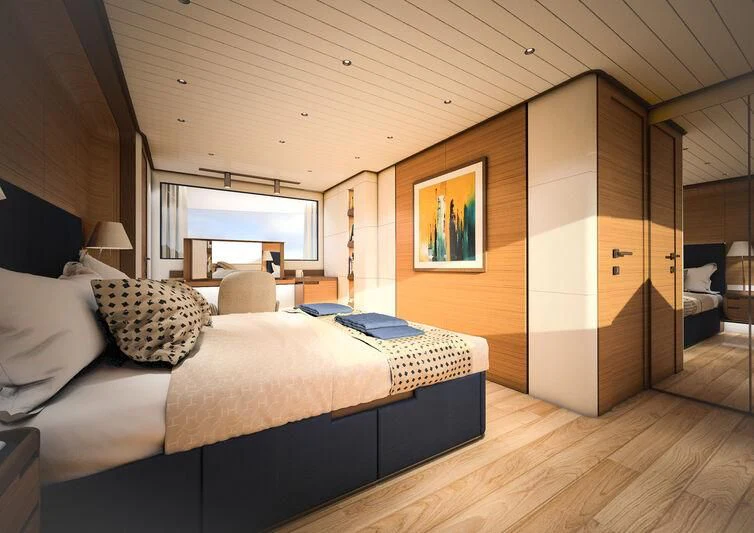 a bedroom with a large bed aboard GIPSY VI Yacht for Sale