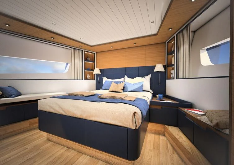 a bedroom with a large bed aboard GIPSY VI Yacht for Sale