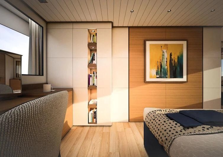 a room with a bed and a bookcase aboard GIPSY VI Yacht for Sale