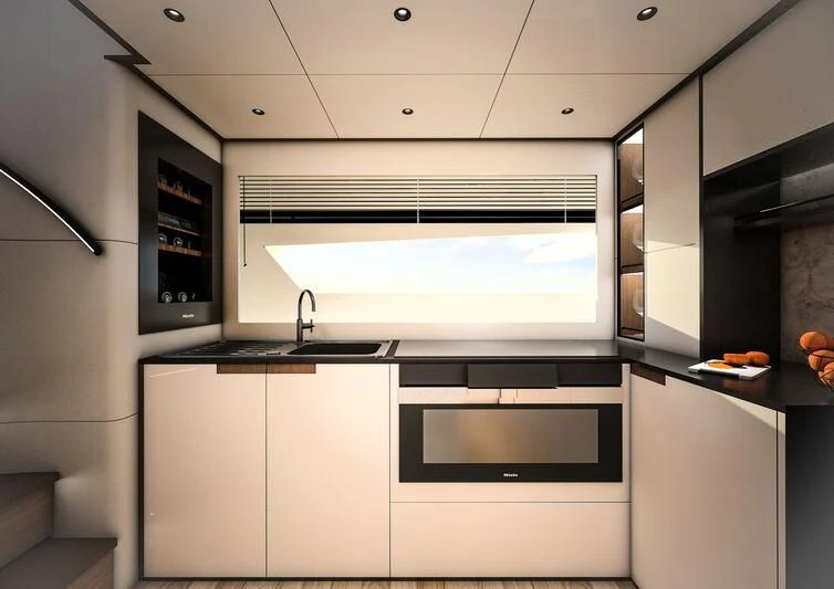 a kitchen with white cabinets aboard GIPSY VI Yacht for Sale