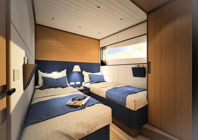 a room with a bed and a desk aboard GIPSY VI Yacht for Sale