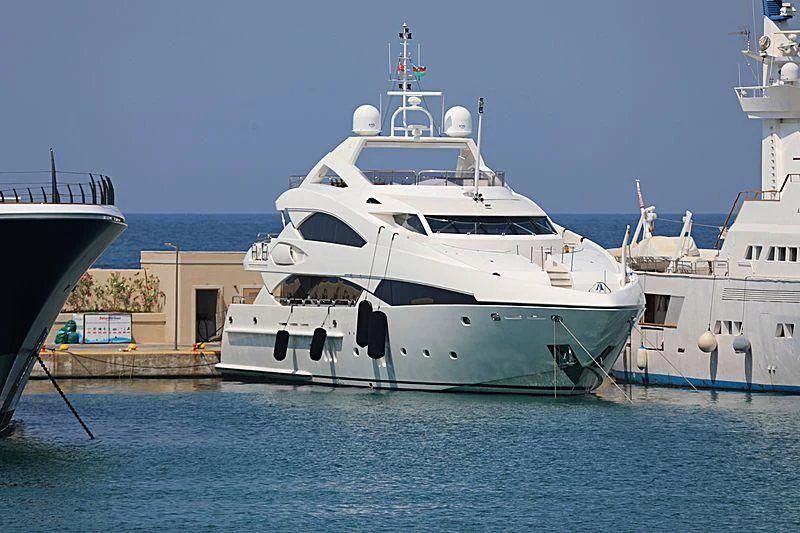 a couple of large white boats aboard IMAN Yacht for Sale