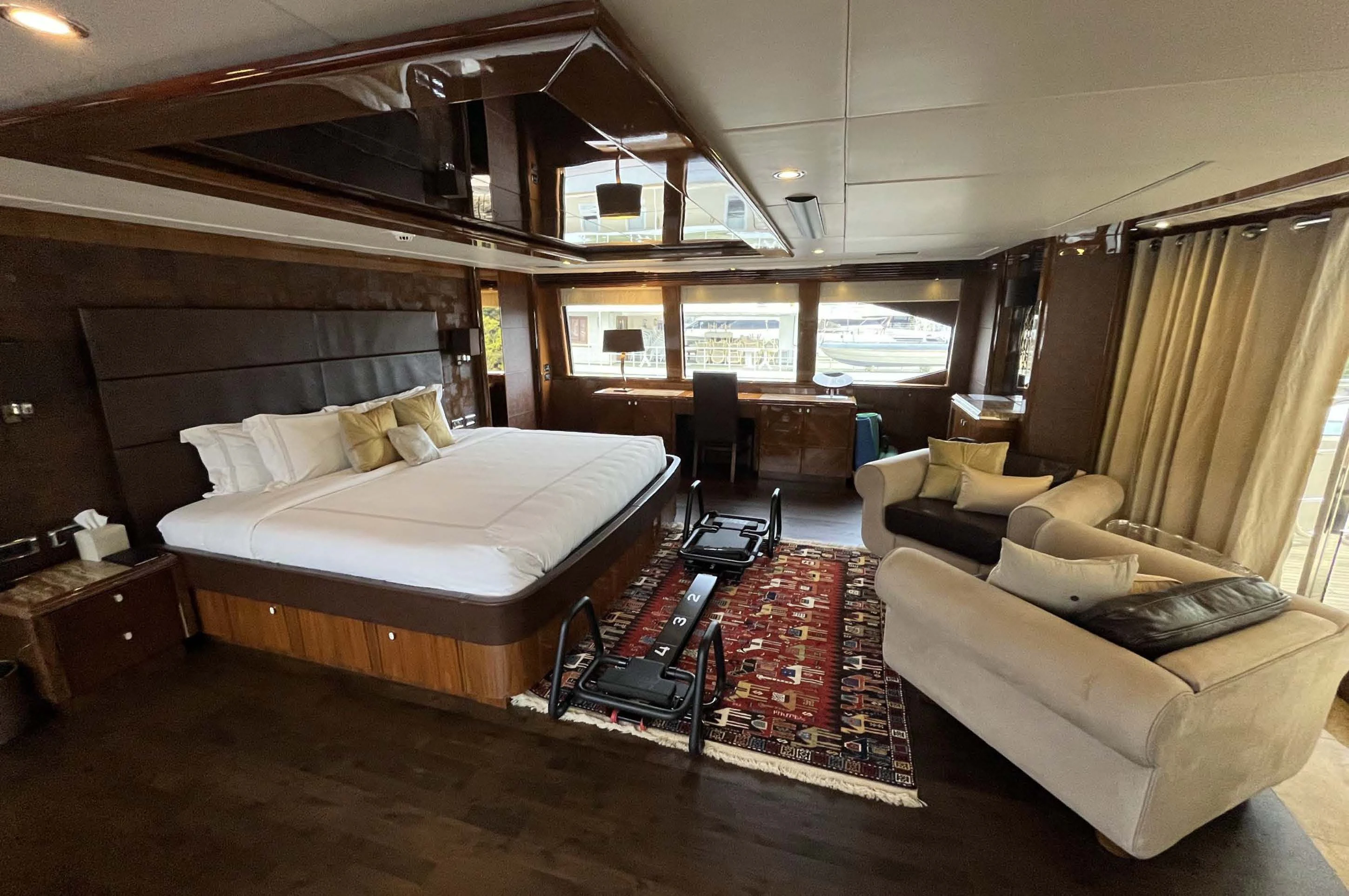 a bed in a room aboard IMAN Yacht for Sale