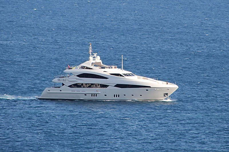 a white yacht in the water aboard IMAN Yacht for Sale
