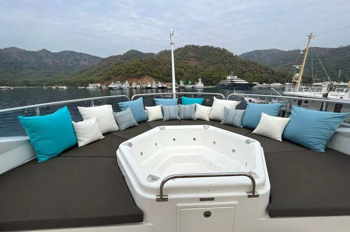a white bathtub on a boat aboard IMAN Yacht for Sale
