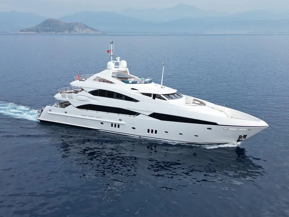a white yacht in the water aboard IMAN Yacht for Sale