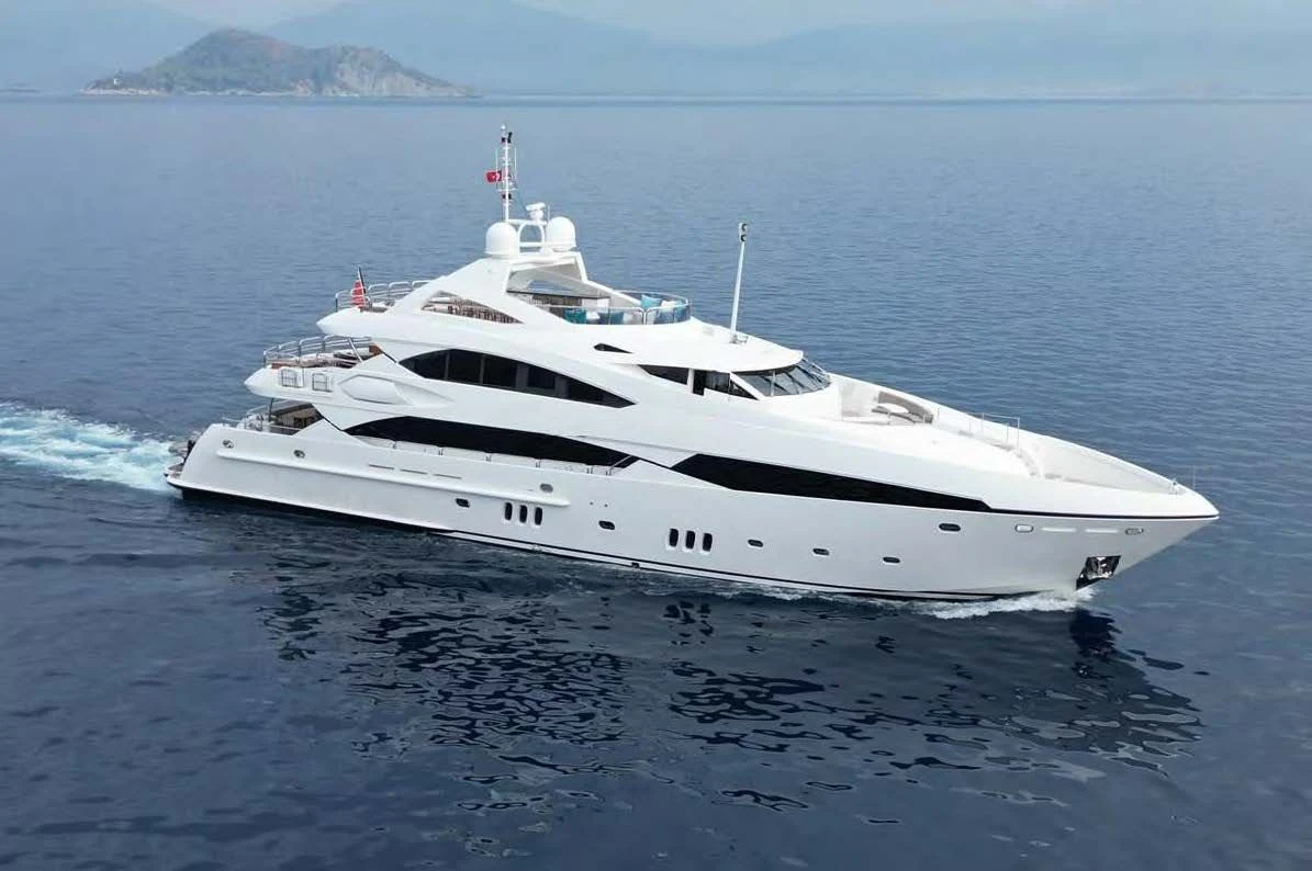 a white yacht in the water aboard IMAN Yacht for Sale