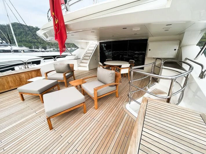 a boat on a deck aboard IMAN Yacht for Sale