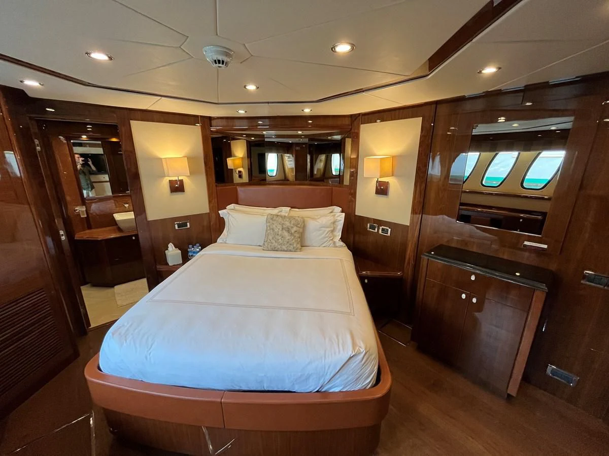 a hotel room with a bed aboard IMAN Yacht for Sale