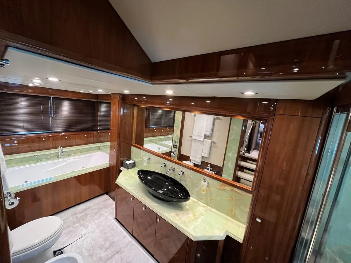 a bathroom with a sink and a counter aboard IMAN Yacht for Sale