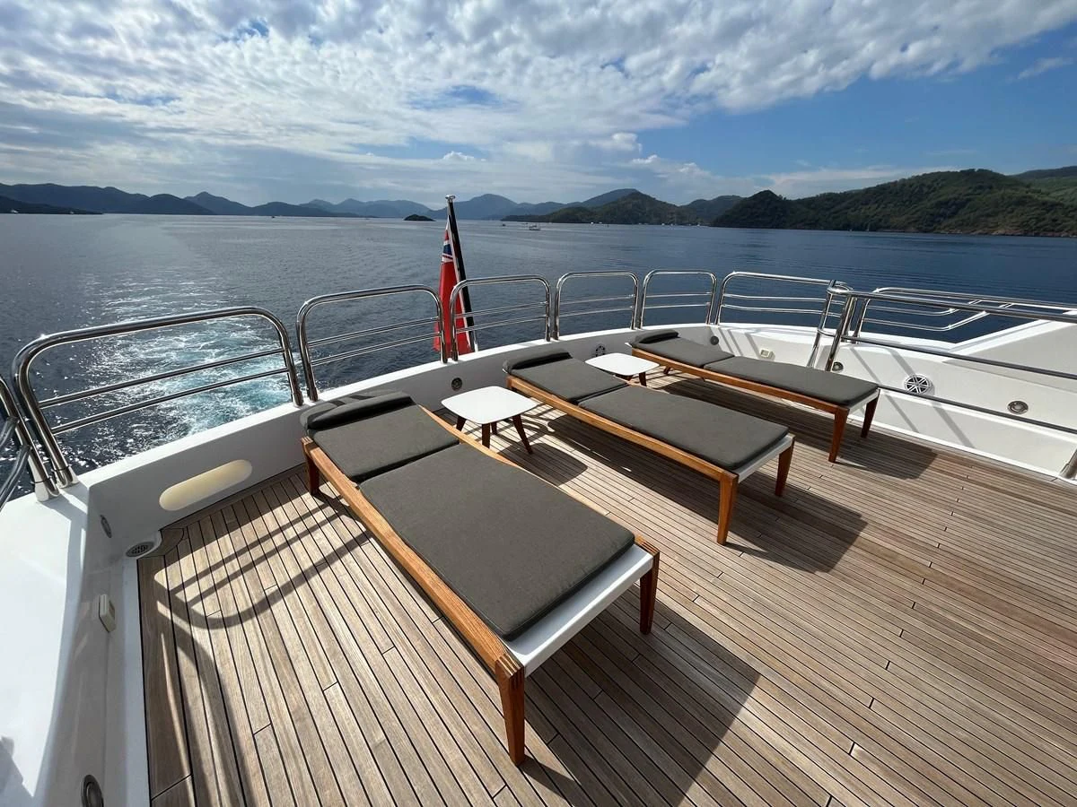 a boat on a deck aboard IMAN Yacht for Sale