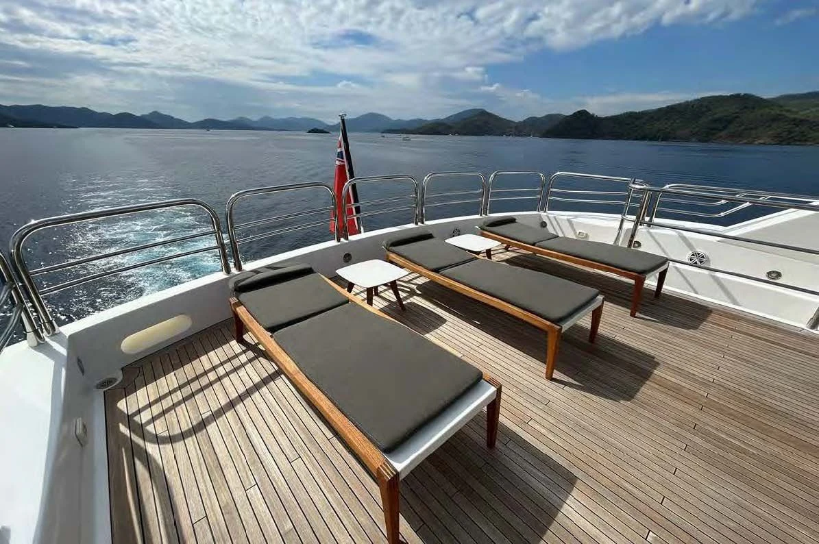 a boat on a deck aboard IMAN Yacht for Sale
