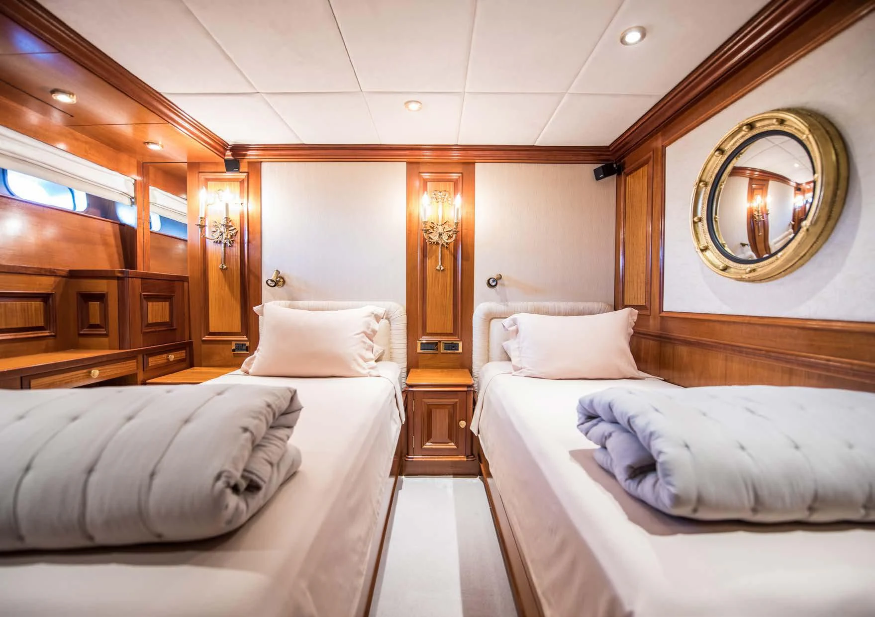 a room with two beds aboard BLUE STAR Yacht for Sale