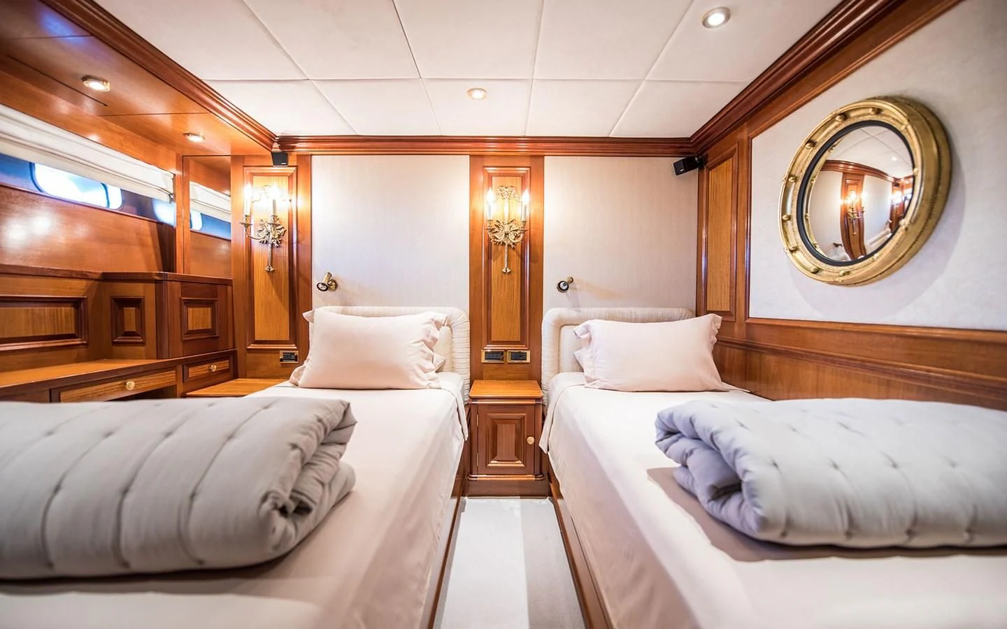 a room with two beds aboard BLUE STAR Yacht for Sale