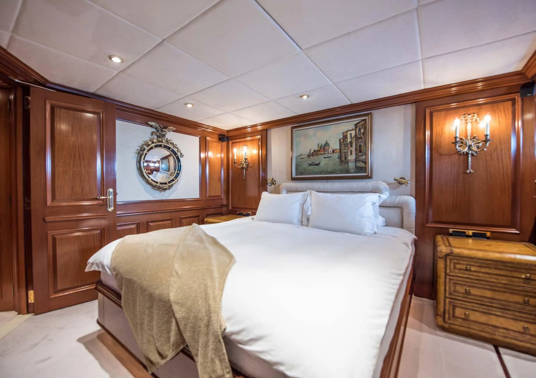 a bedroom with a large bed aboard BLUE STAR Yacht for Sale