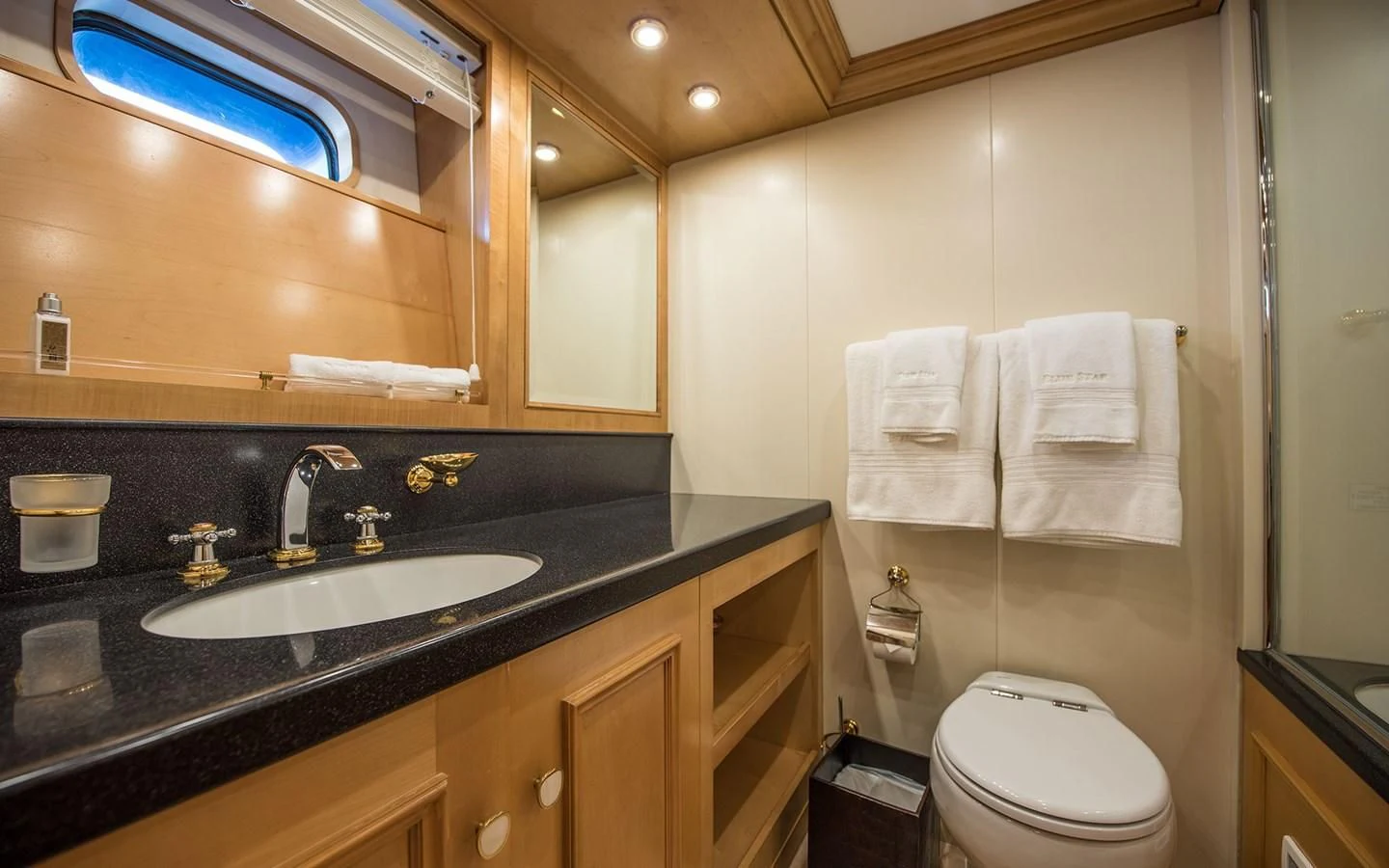 a bathroom with a sink and toilet aboard BLUE STAR Yacht for Sale
