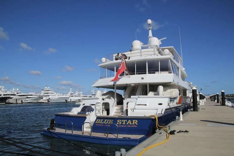 a boat docked at a pier aboard BLUE STAR Yacht for Sale