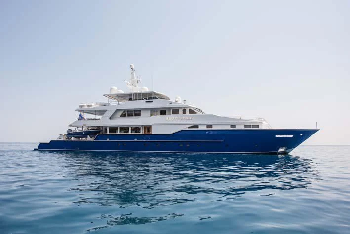 a large boat in the water aboard BLUE STAR Yacht for Sale