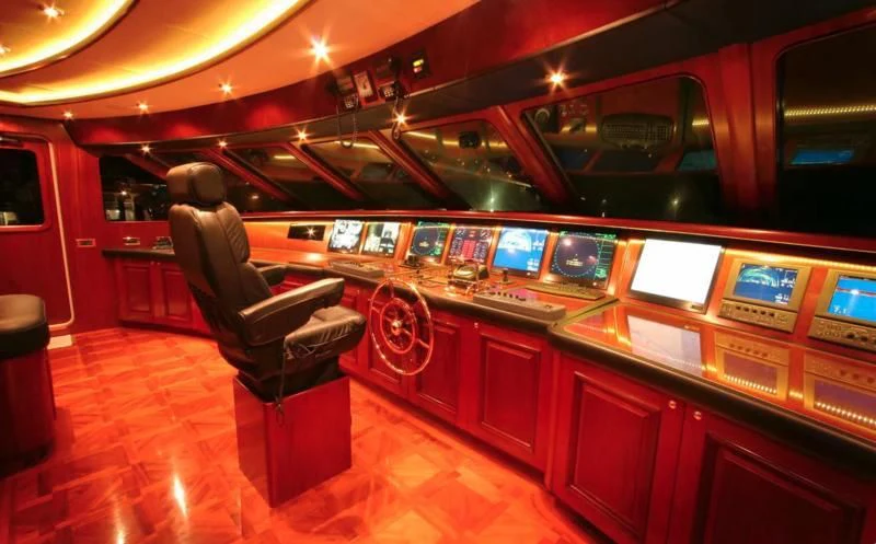 a bar with a bar and a chair aboard BLUE STAR Yacht for Sale