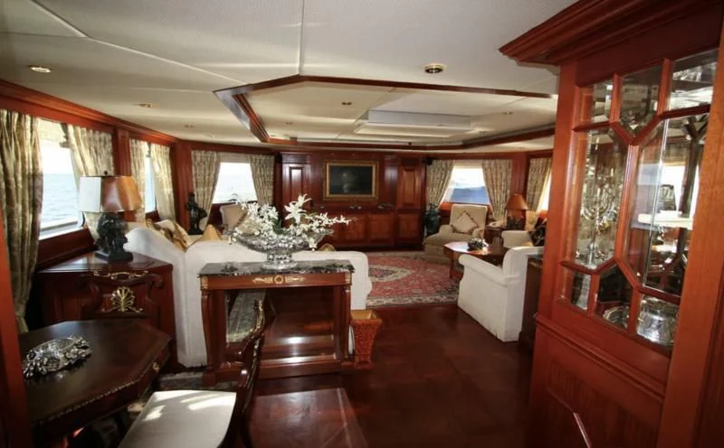 a room with a bed and a desk aboard BLUE STAR Yacht for Sale