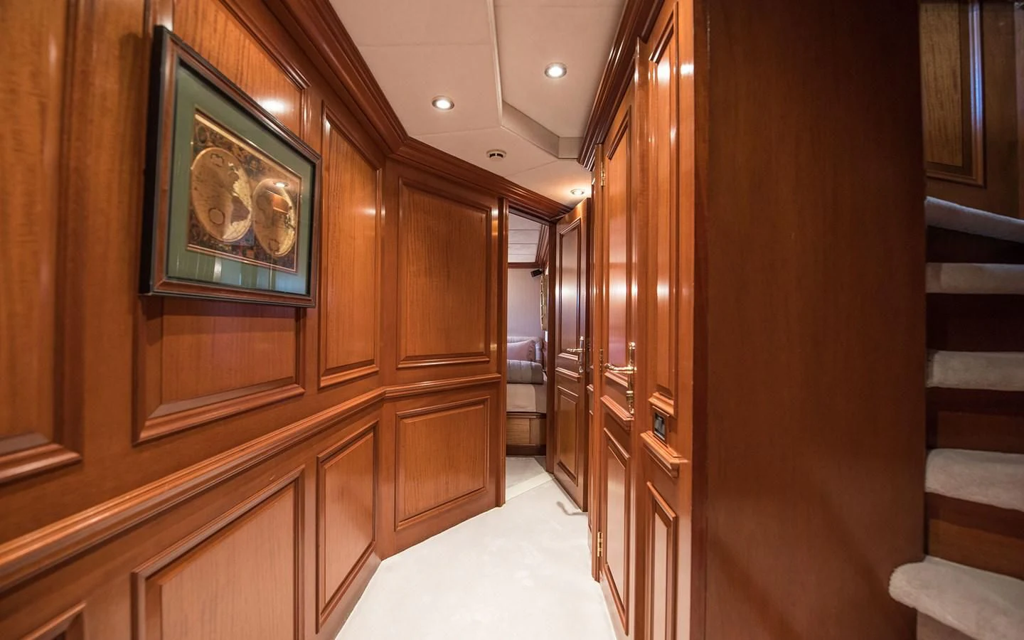 a room with wooden cabinets aboard BLUE STAR Yacht for Sale