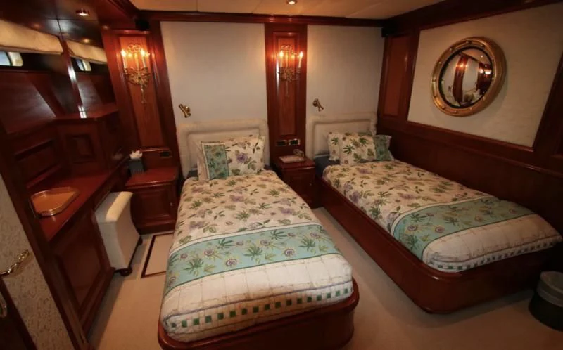 a couple of beds in a hotel room aboard BLUE STAR Yacht for Sale