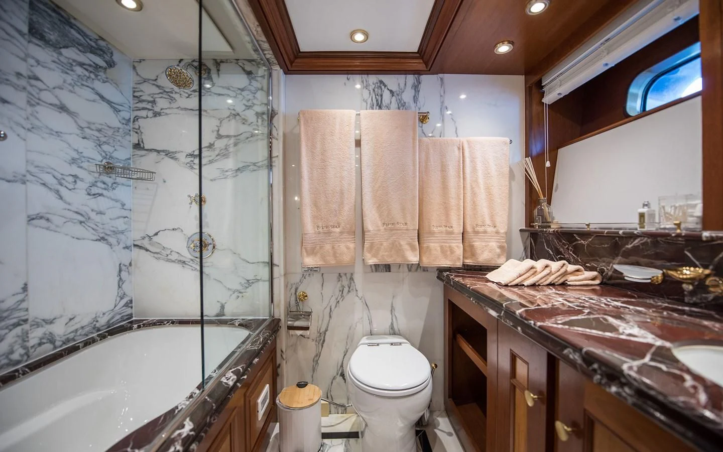 a bathroom with a marble counter top aboard BLUE STAR Yacht for Sale