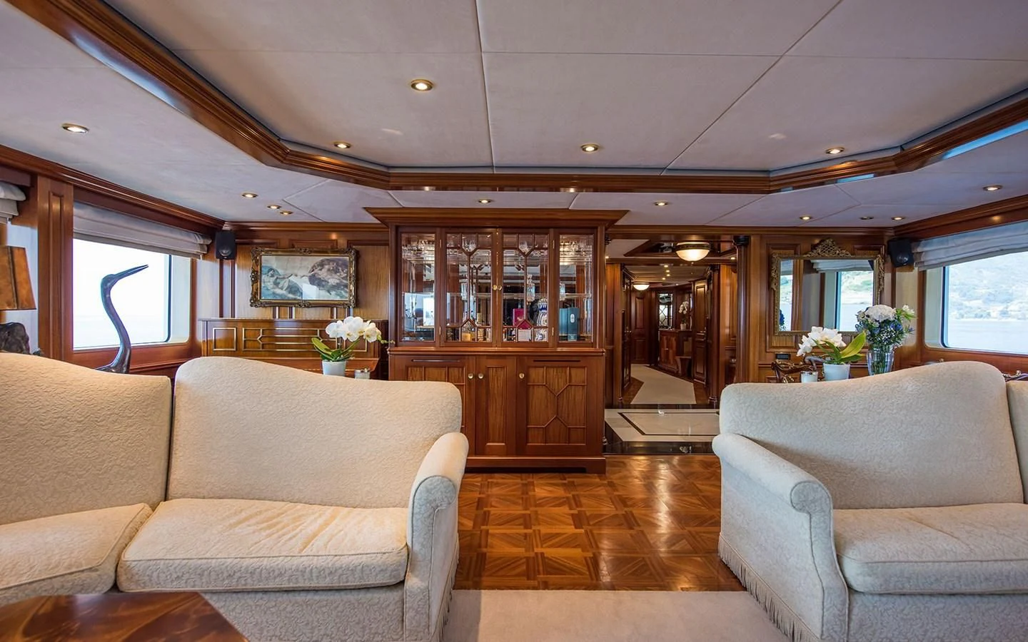 a living room with couches aboard BLUE STAR Yacht for Sale