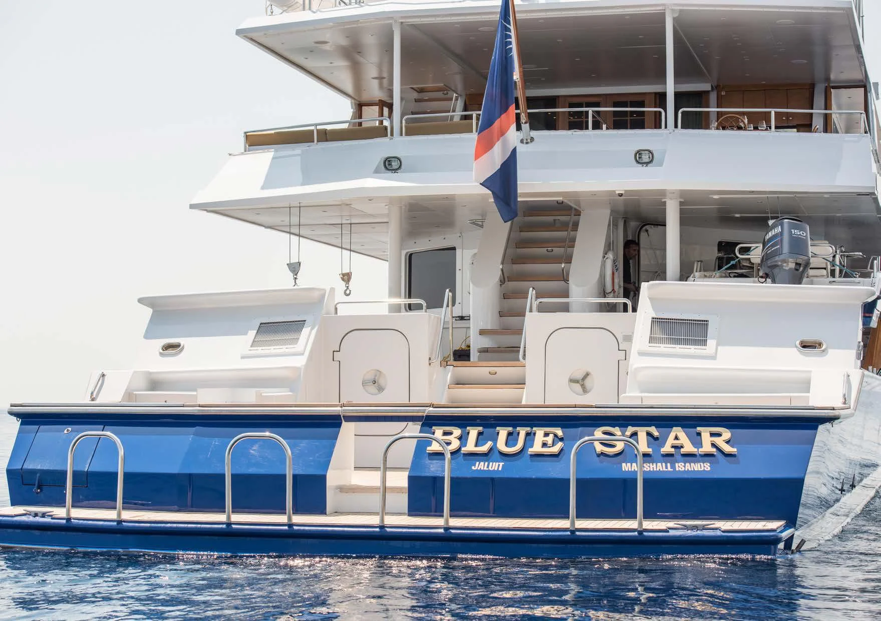 a large boat in a large body of water aboard BLUE STAR Yacht for Sale