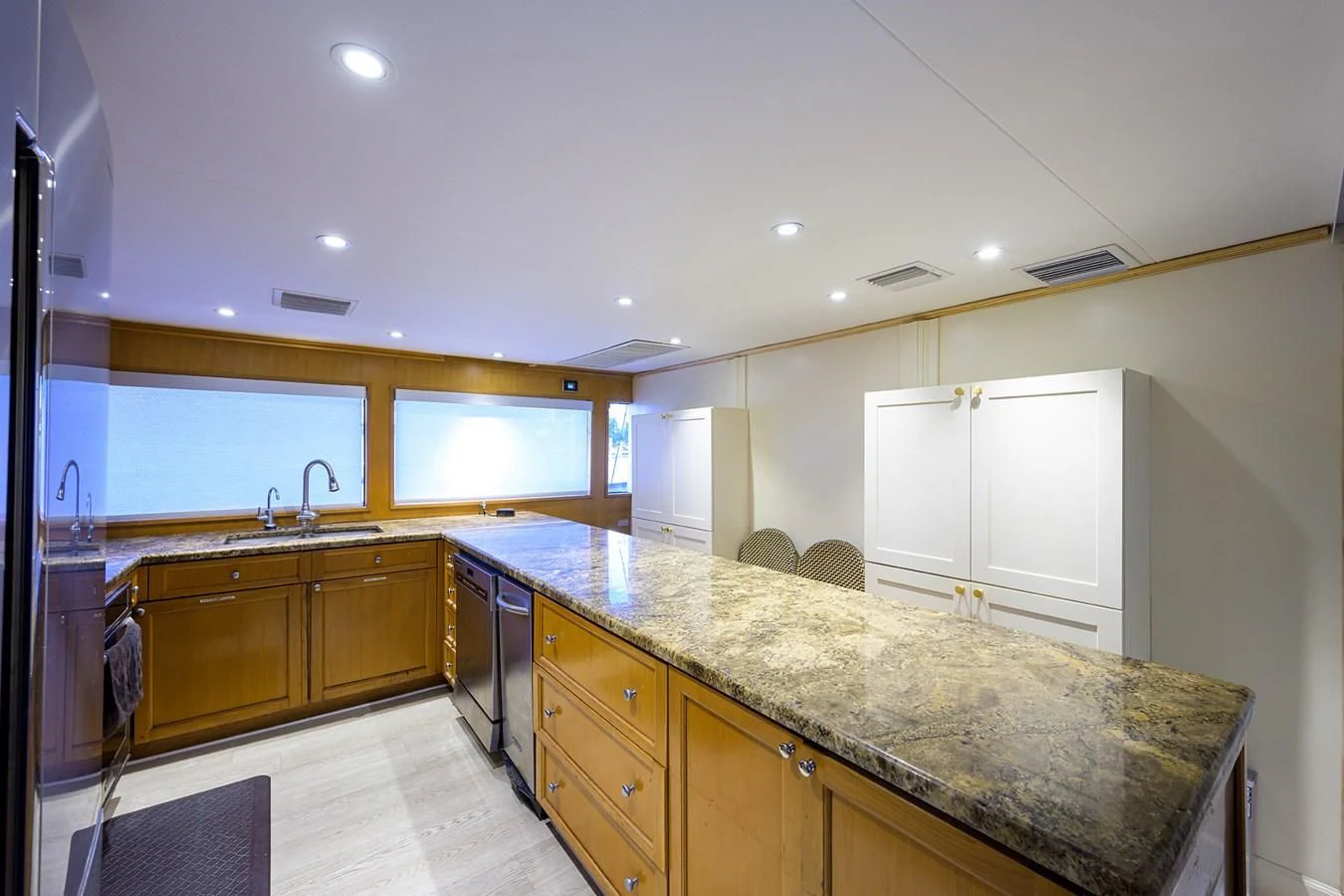 a kitchen with a marble counter top aboard OCEAN DRIVE Yacht for Sale