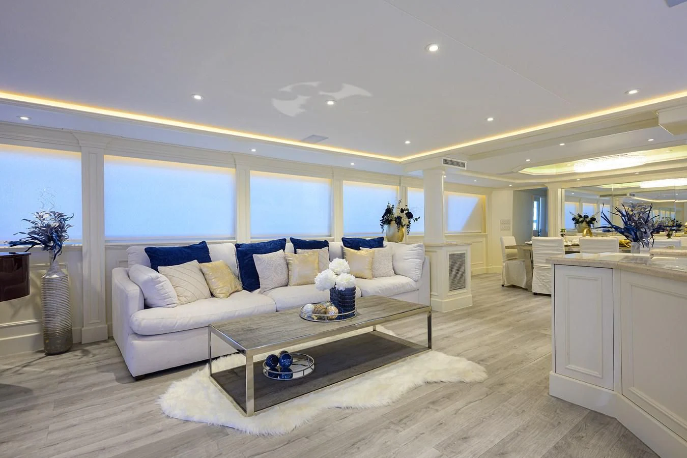 a living room with a large window aboard OCEAN DRIVE Yacht for Sale