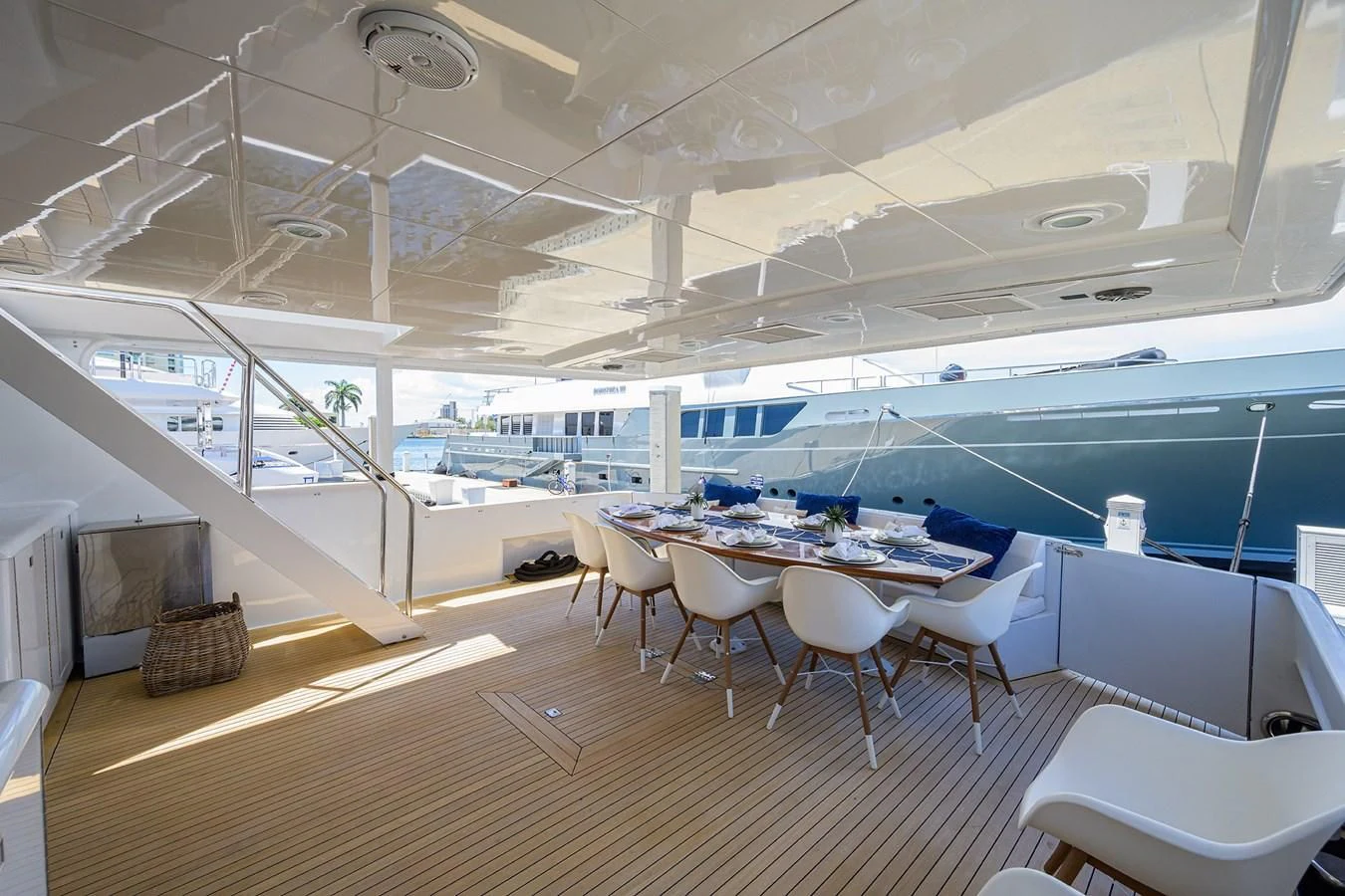 a room with tables and chairs aboard OCEAN DRIVE Yacht for Sale