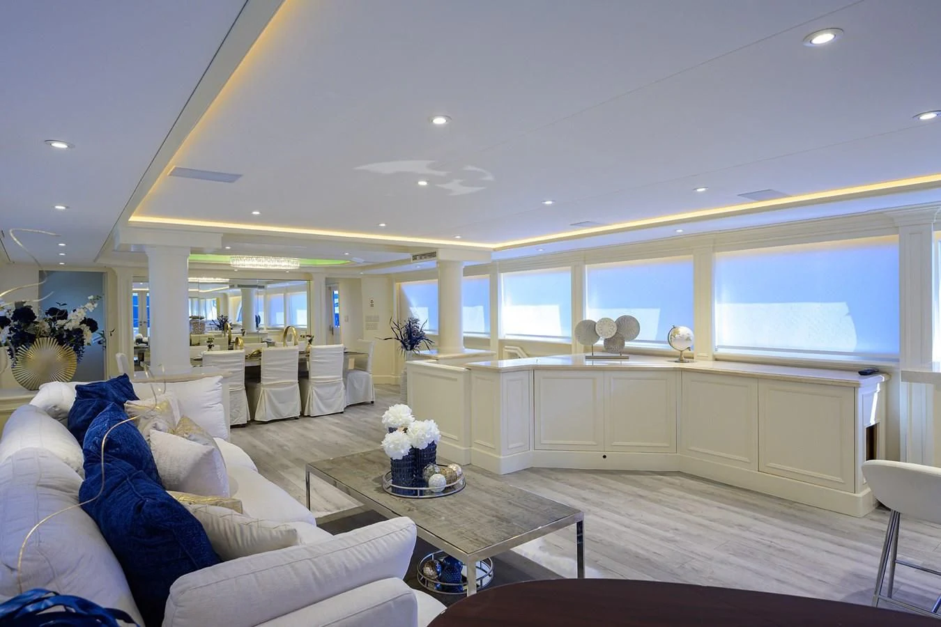 a living room with a large window aboard OCEAN DRIVE Yacht for Sale
