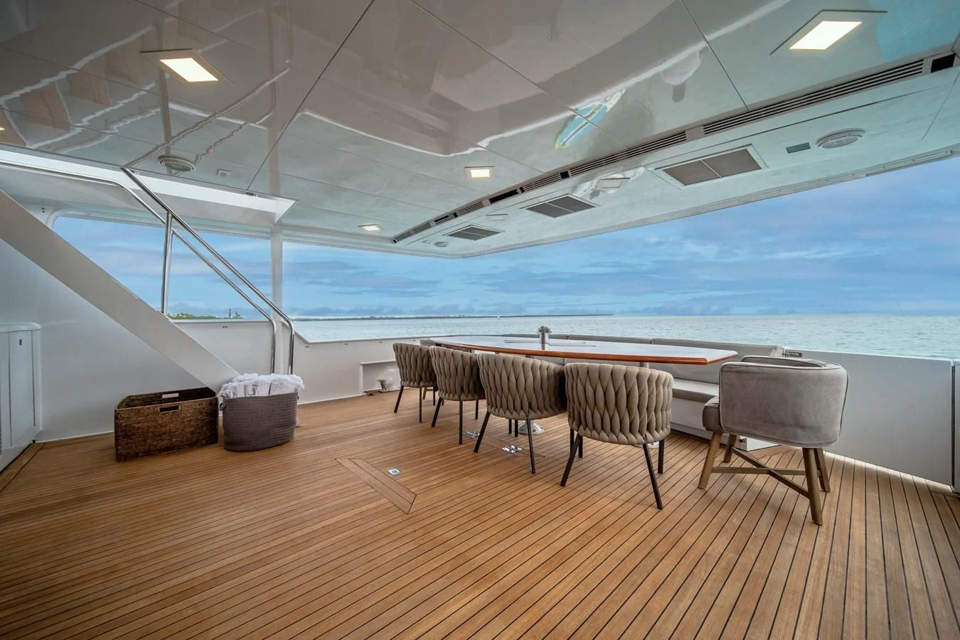 a room with a pool table and chairs aboard OCEAN DRIVE Yacht for Sale