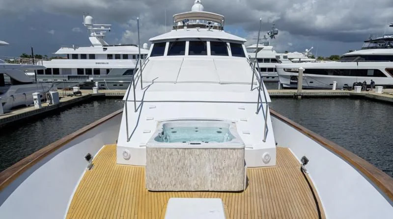 a large white boat in a harbor aboard OCEAN DRIVE Yacht for Sale