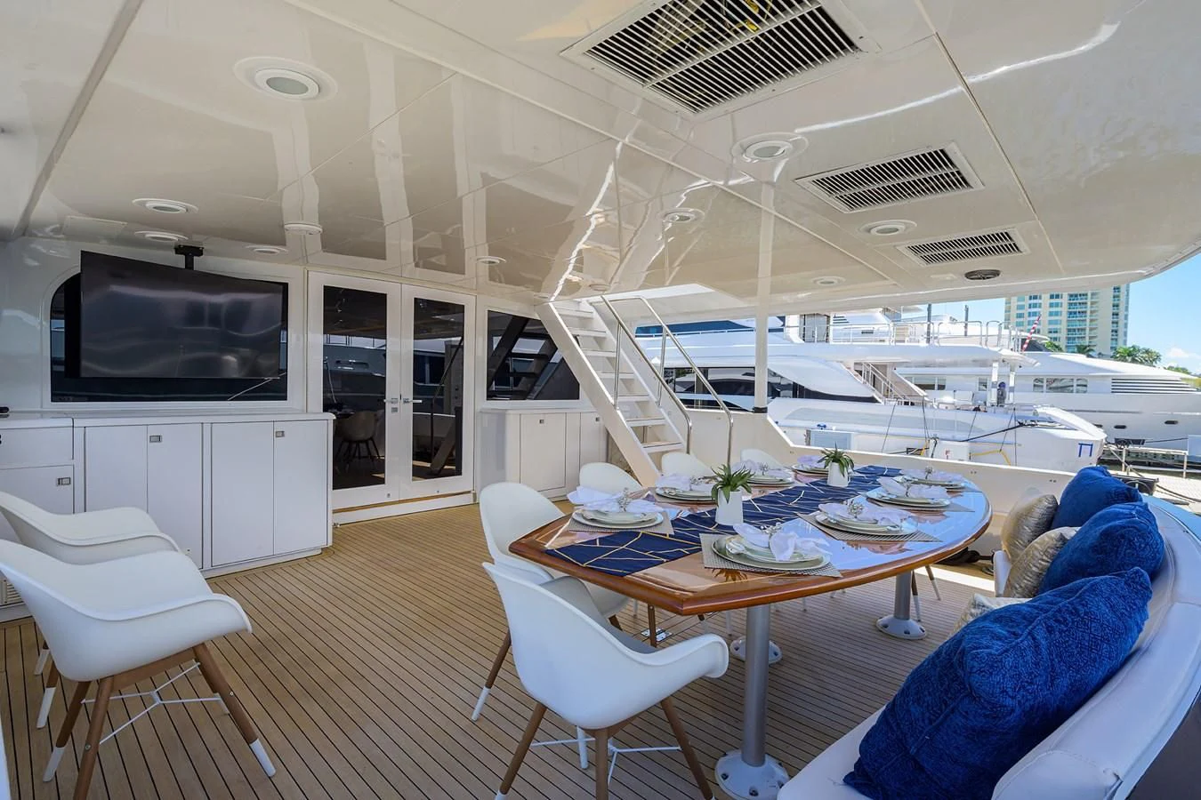 a boat with a table and chairs aboard OCEAN DRIVE Yacht for Sale