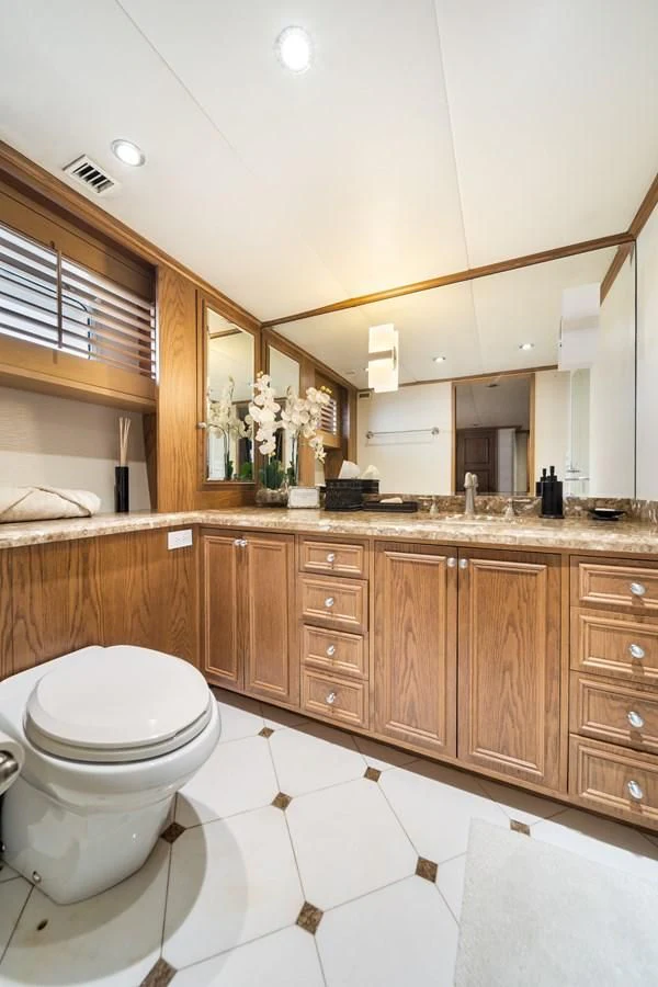 a bathroom with a large mirror aboard OCEAN DRIVE Yacht for Sale