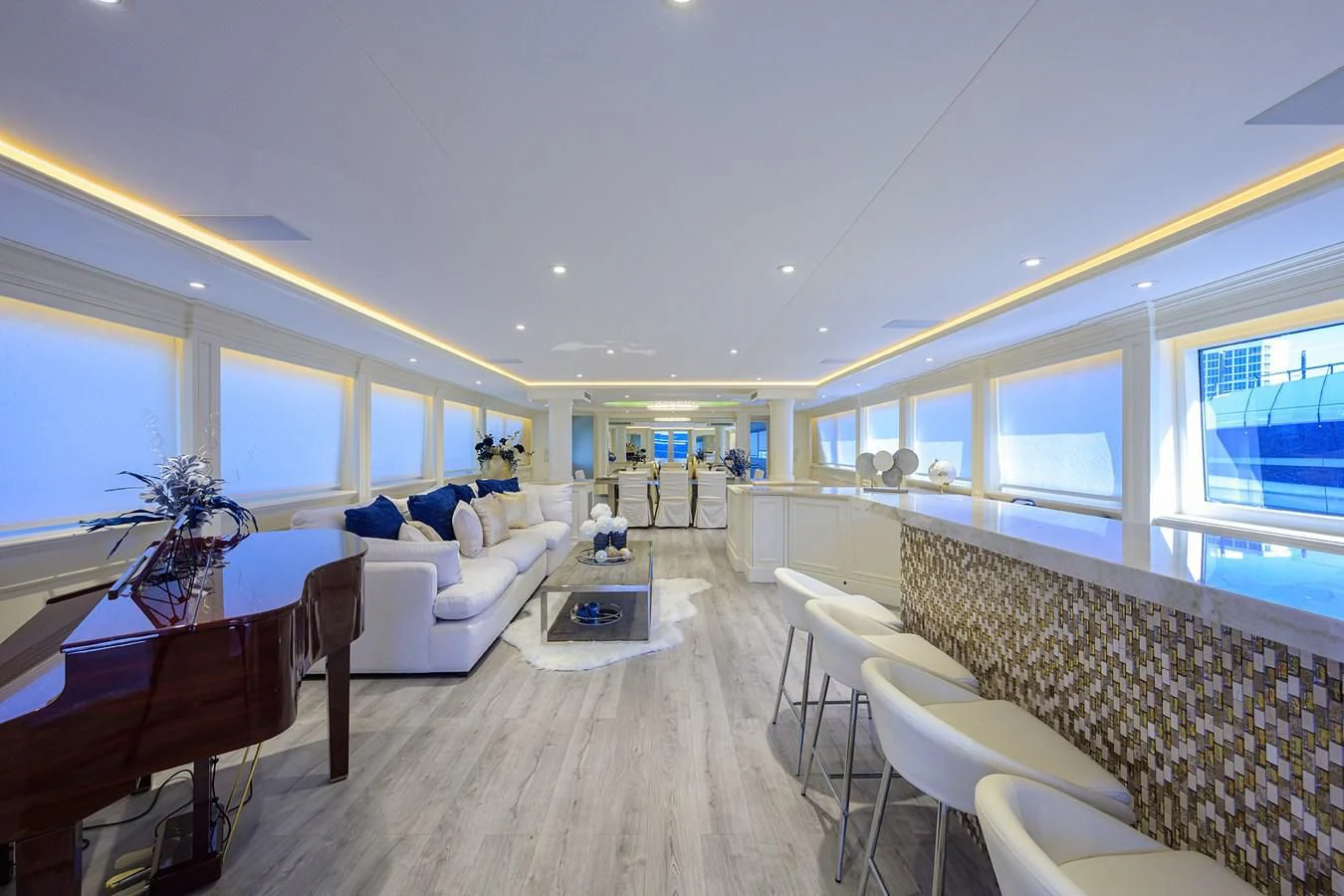 a room with a couch and a table and a television aboard OCEAN DRIVE Yacht for Sale