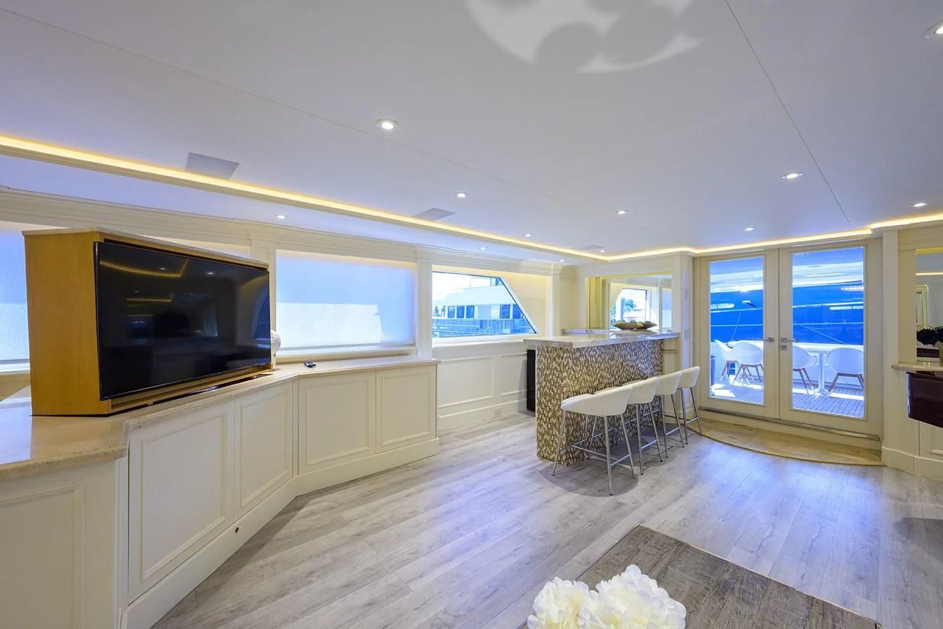 a kitchen with a table and chairs aboard OCEAN DRIVE Yacht for Sale