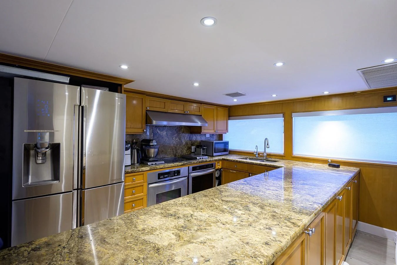 a kitchen with granite counter tops aboard OCEAN DRIVE Yacht for Sale