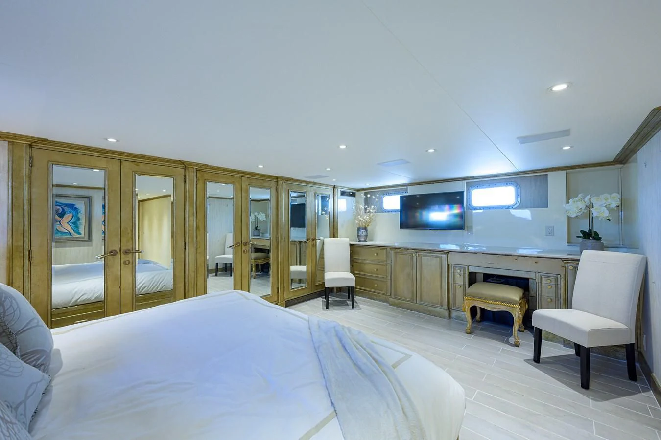 a bedroom with a large bed aboard OCEAN DRIVE Yacht for Sale