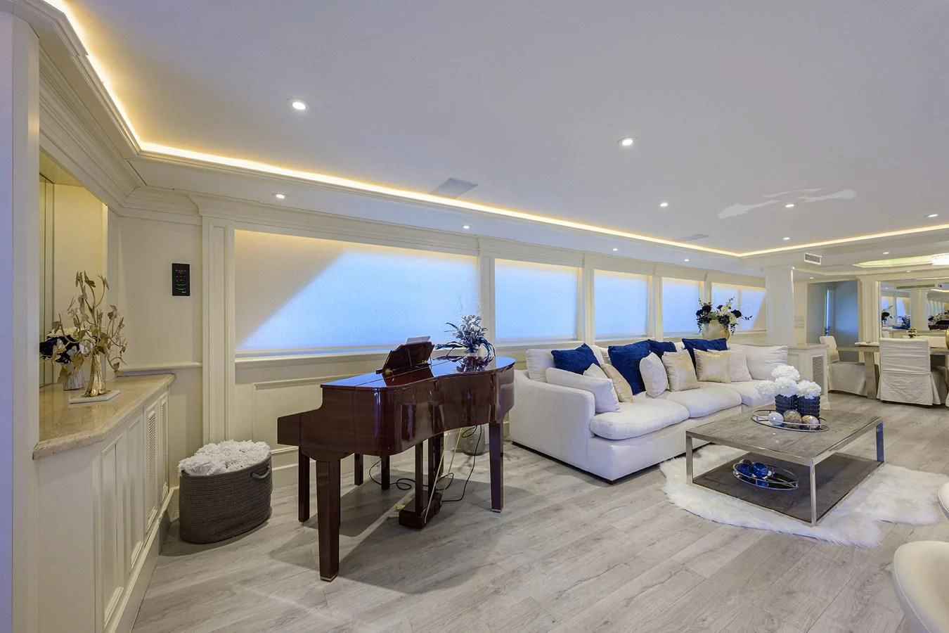 a living room with a large window aboard OCEAN DRIVE Yacht for Sale