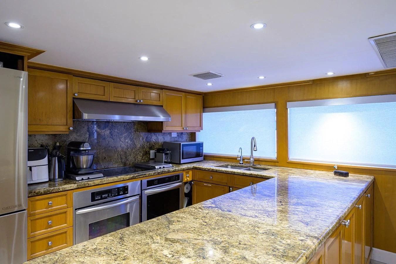 a kitchen with granite counter tops aboard OCEAN DRIVE Yacht for Sale