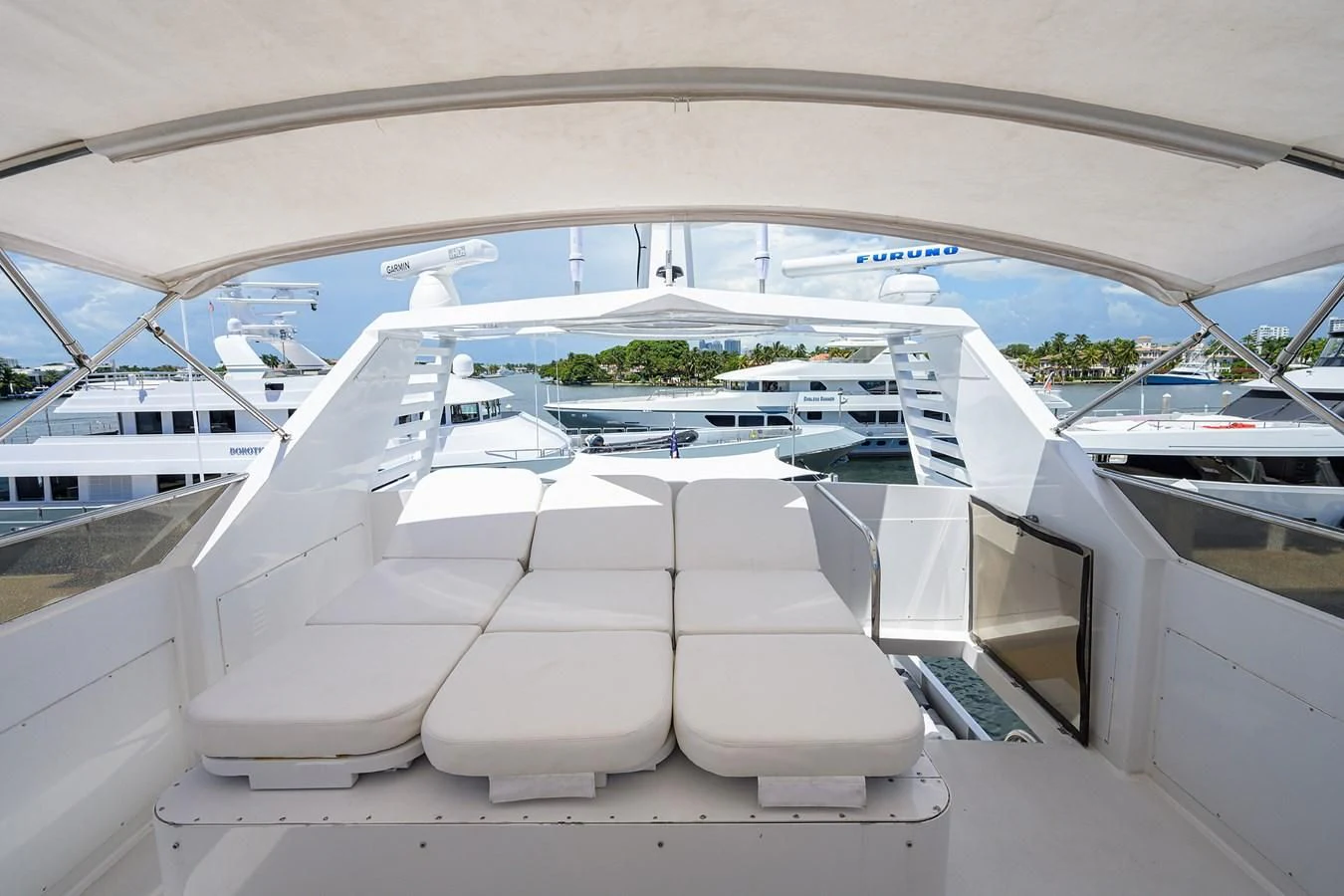 a room with many white chairs aboard OCEAN DRIVE Yacht for Sale